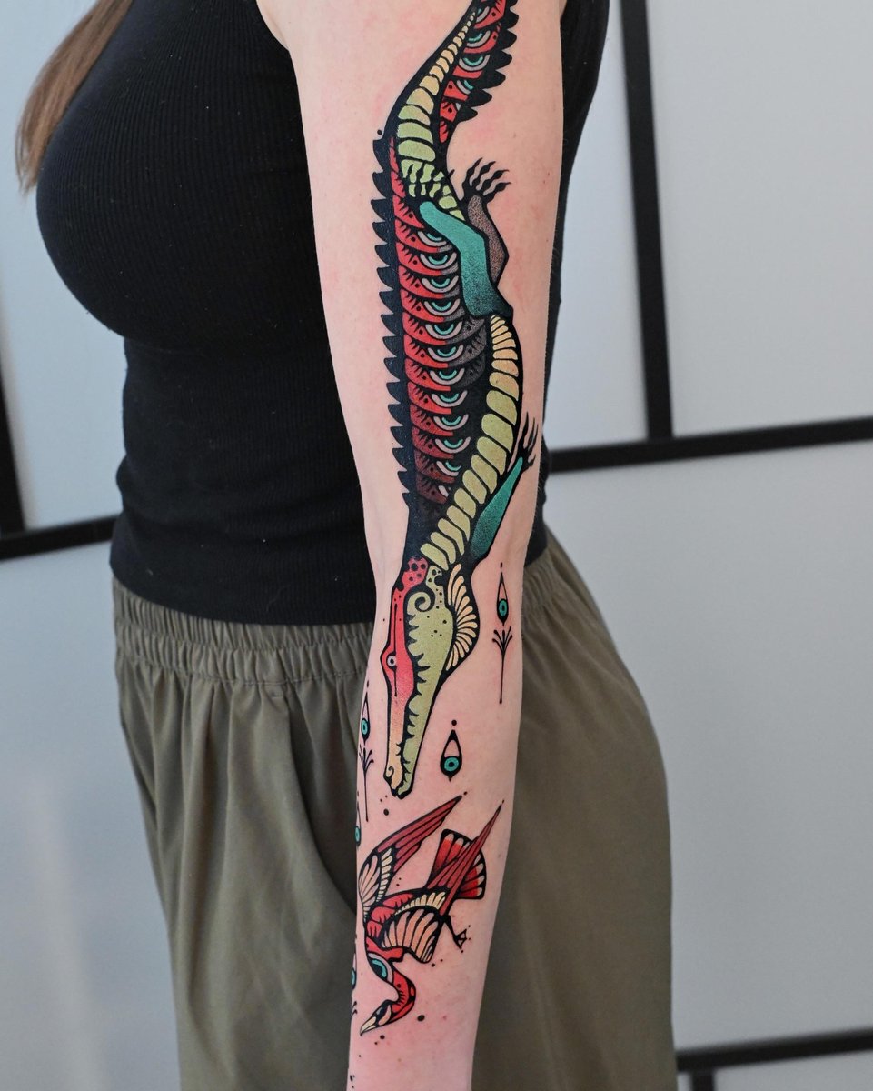 Photo of the tattoo titled Gator and Bird Companion