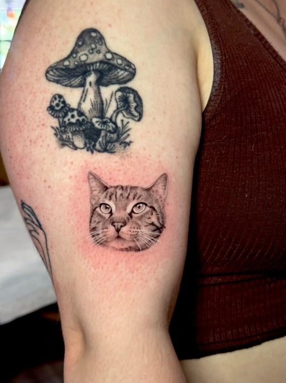 Photo of the tattoo titled Toby's Portrait - A Symbol of Hope