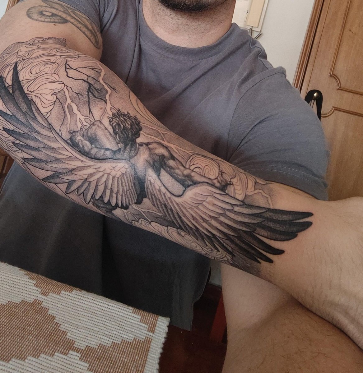 Photo of the tattoo titled Icarus's Ascent and Fall