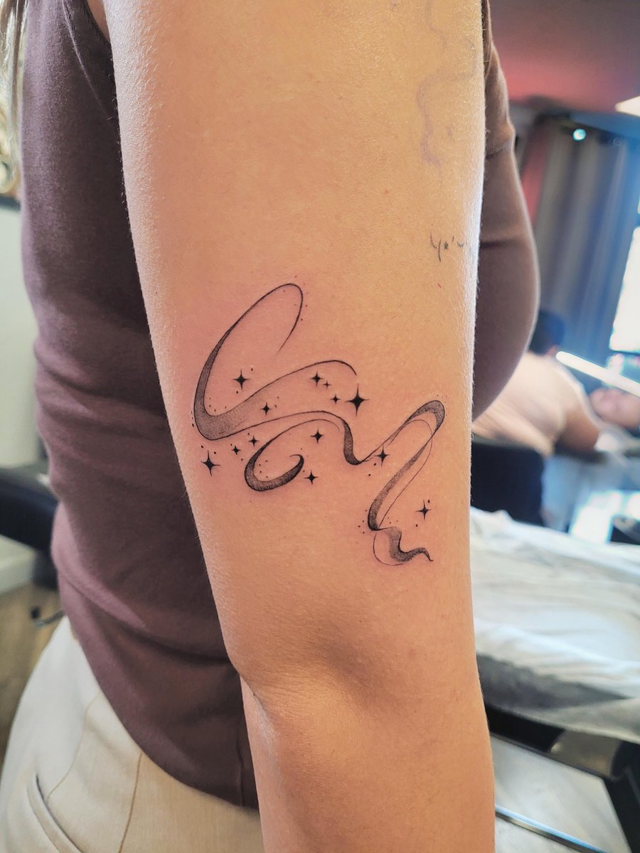 Photo of the tattoo titled My Aquarius Zodiac Constellation