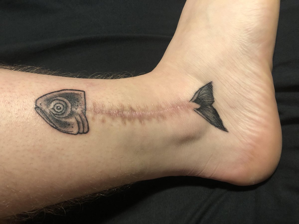 Photo of the tattoo titled Fish Bones Symbolize Resilience