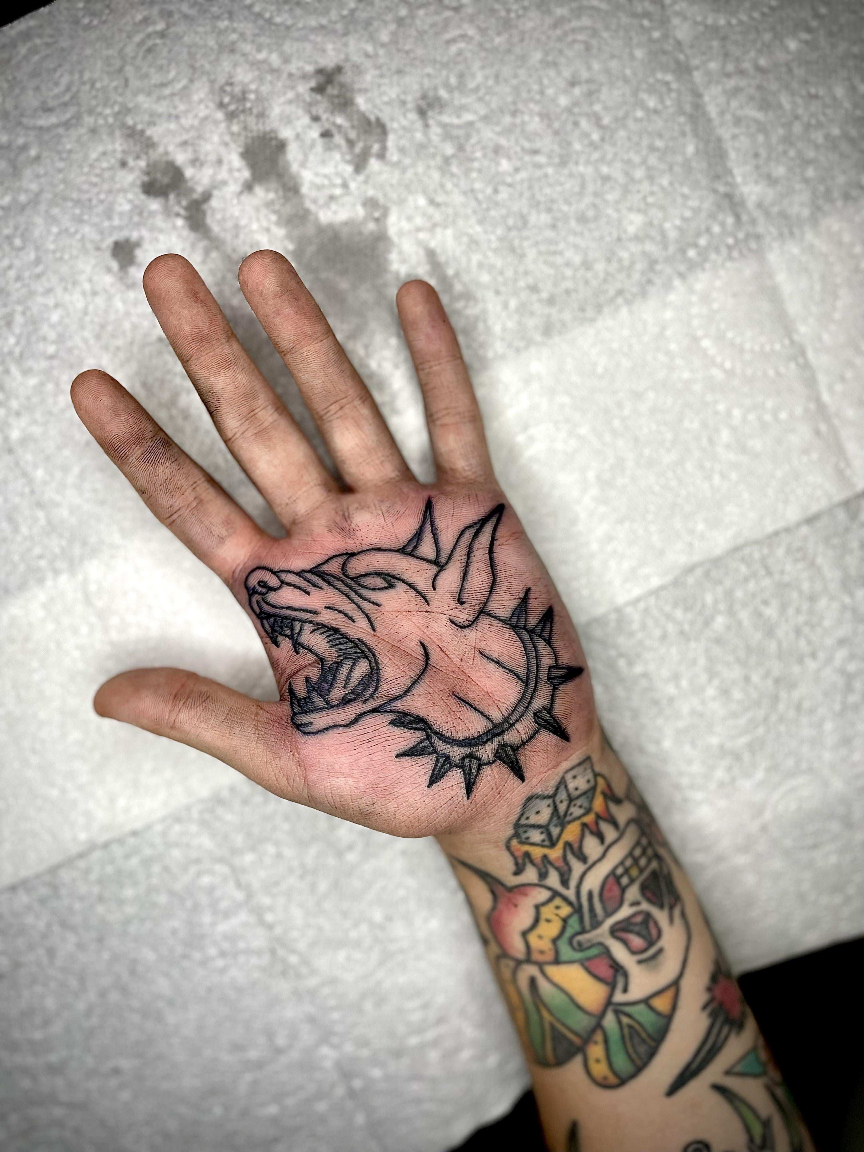 Photo of the tattoo titled A Dog's Paw Print