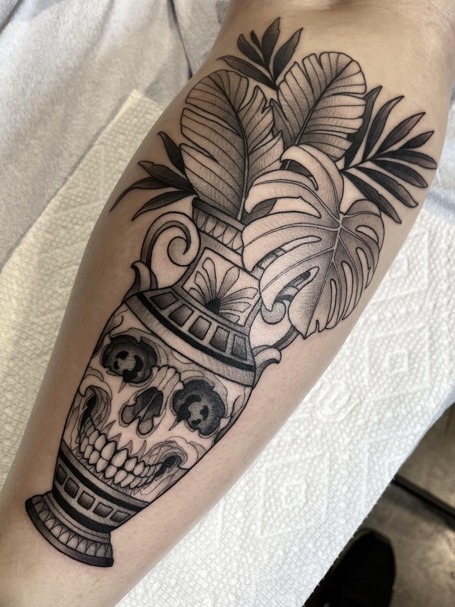Photo of the tattoo titled Skull Vase Artistry