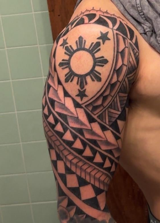 Photo of the tattoo titled Polynesian Tribal Sleeve Inquiry