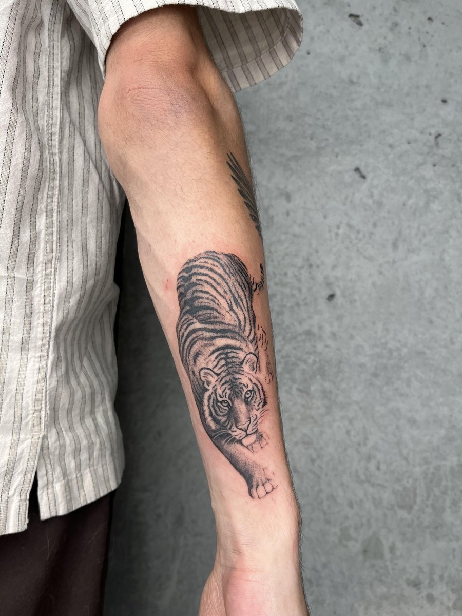 Photo of the tattoo titled Majestic Tiger Roars Its Strength