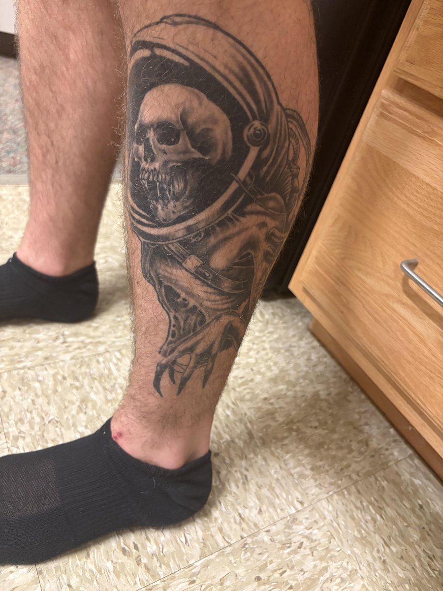 Photo of the tattoo titled Filling the Gaps: Universe or Chessboard?