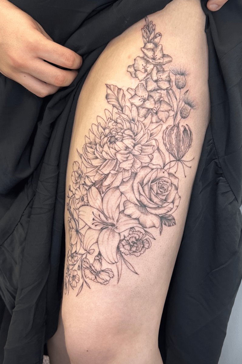 Photo of the tattoo titled Floral Crests Inspired by Even in Arcadia