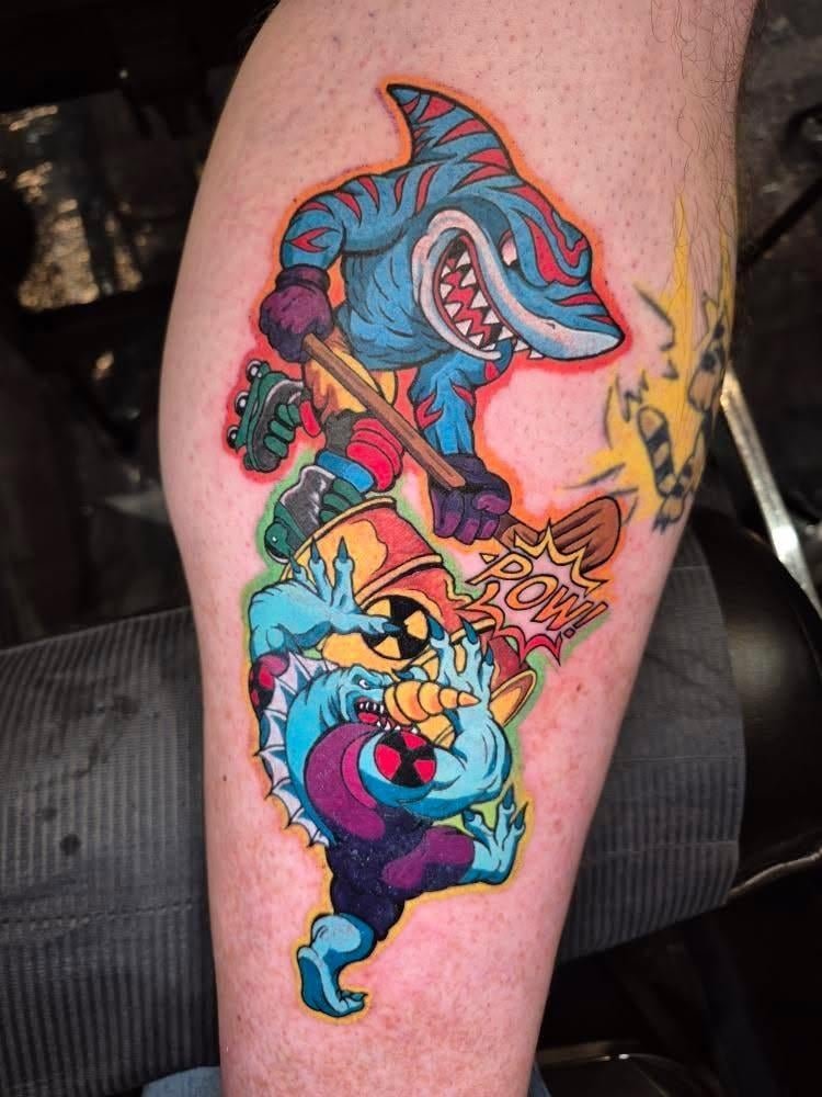 Photo of the tattoo titled Street Sharks Tattoo Wins Award