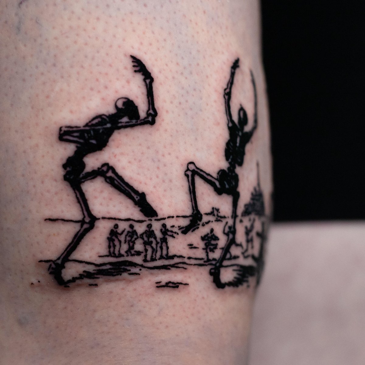 Photo of the tattoo titled Dancing Skeletons and a Cat