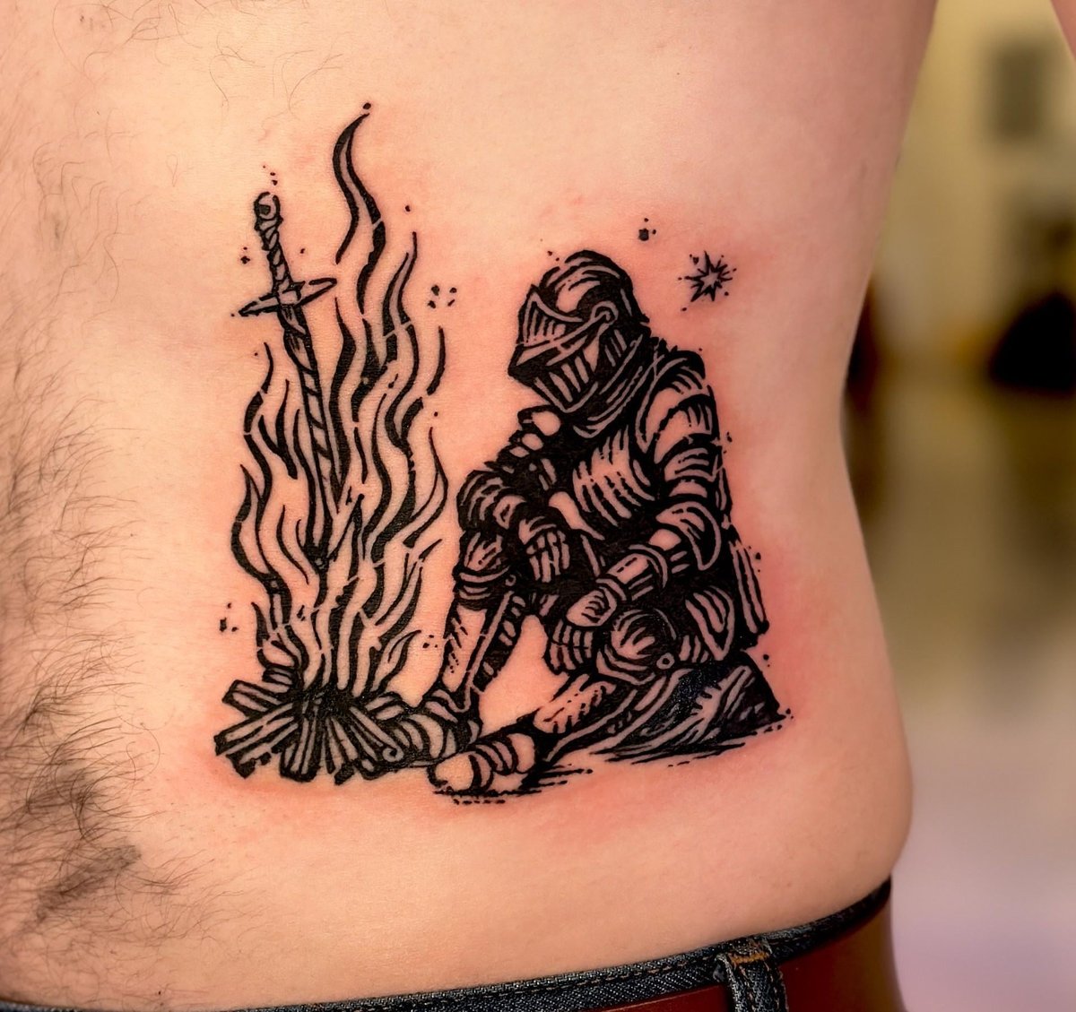 Photo of the tattoo titled Dark Souls Bonfire Woodcut