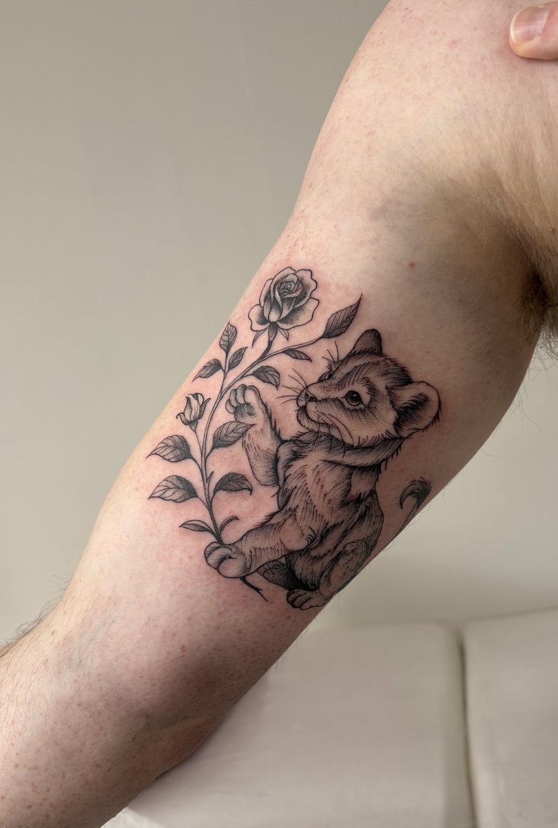 Photo of the tattoo titled Son's Name and Birth Month Flower