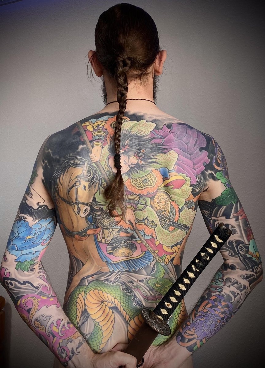 Photo of the tattoo titled Massive Back and Sleeve Transformation