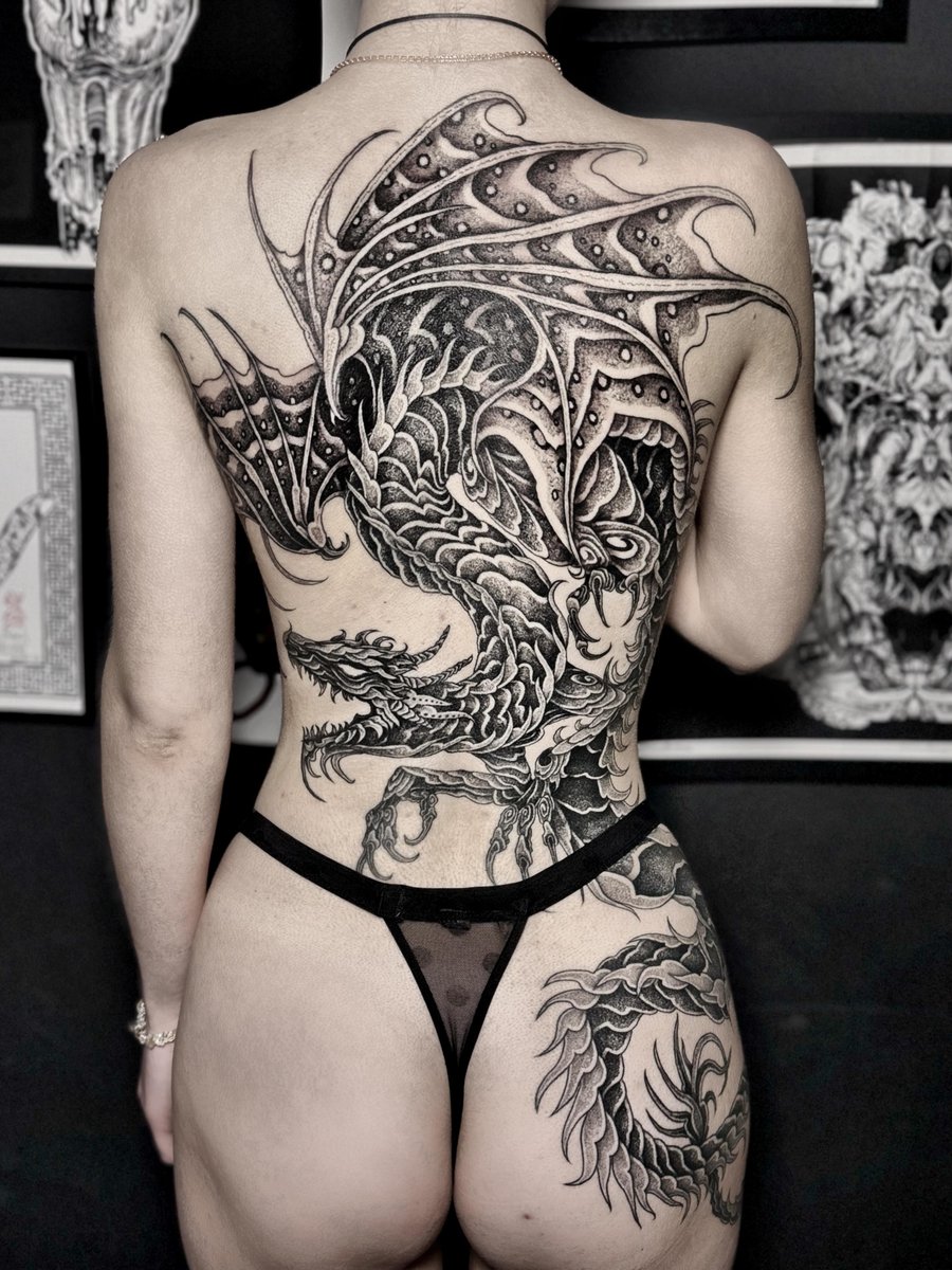 Photo of the tattoo titled Dragon Embracing Body's Flow