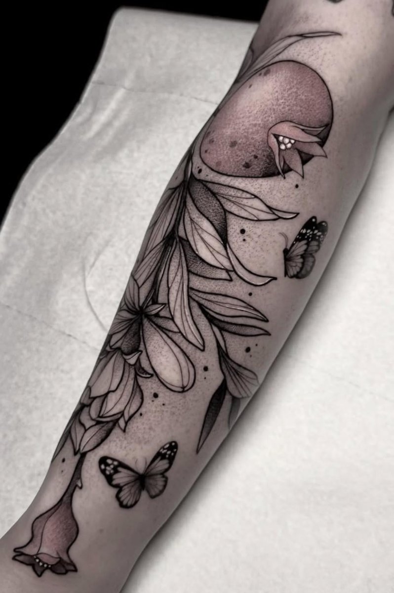 Photo of the tattoo titled Utah Raptor and Flower Tattoo Quest