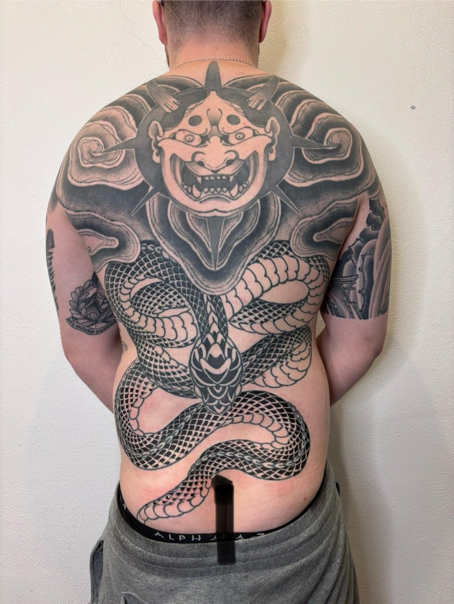 Photo of the tattoo titled My finished snake tattoo