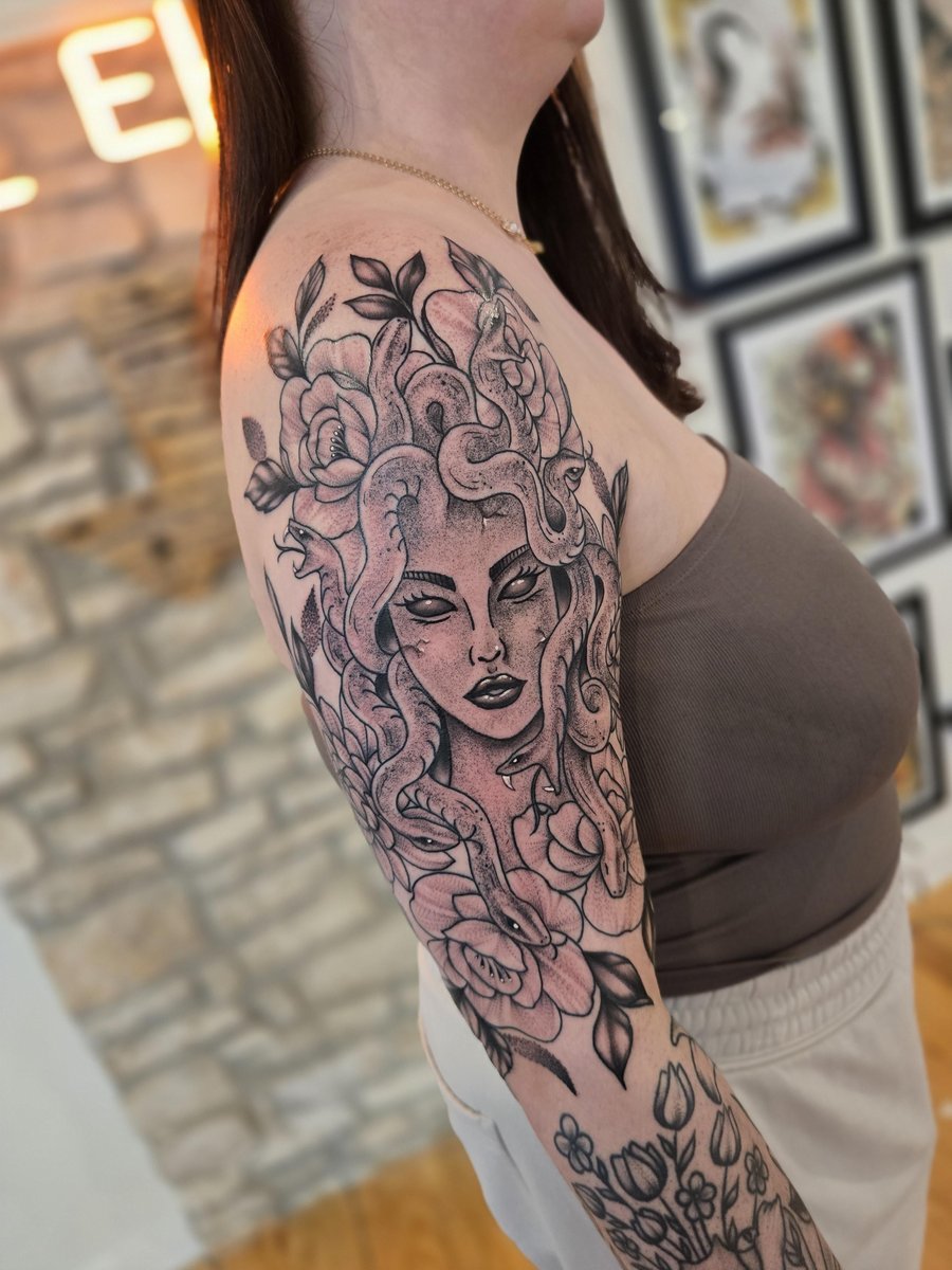 Photo of the tattoo titled Classic Medusa with Floral Accents