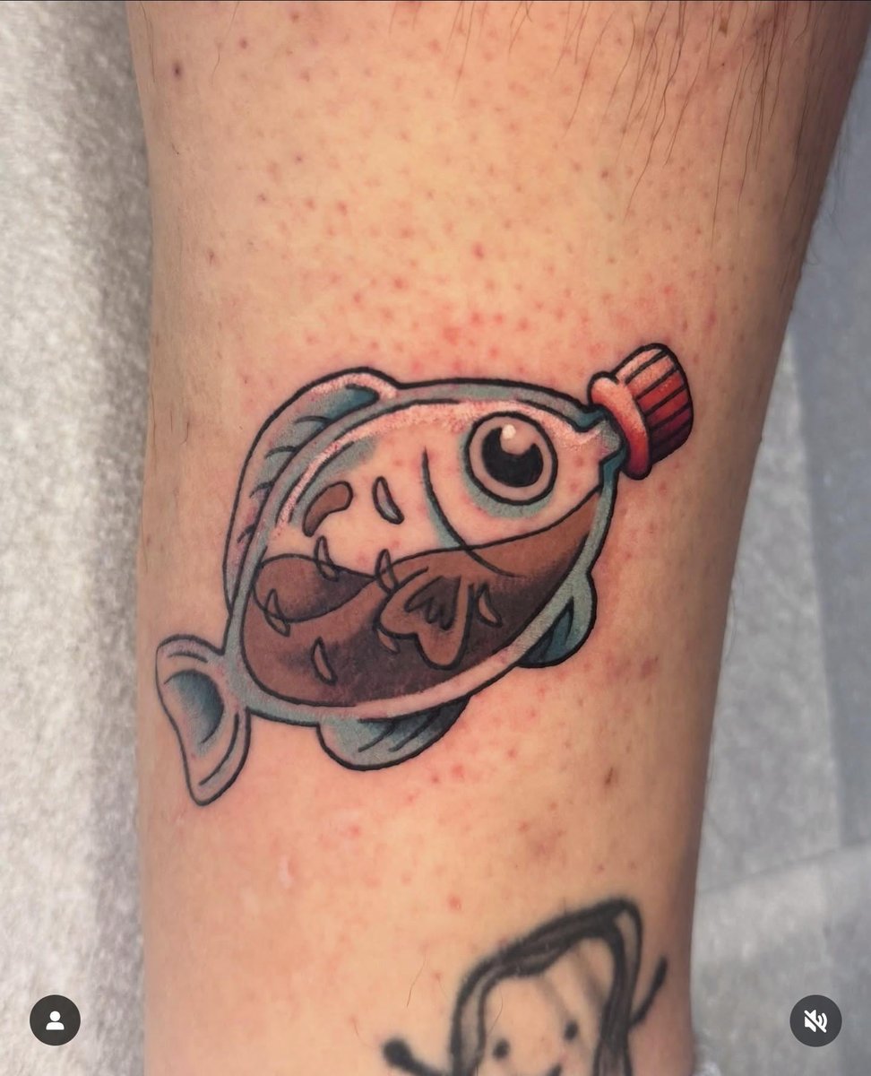 Photo of the tattoo titled Happy Little Soy Fish