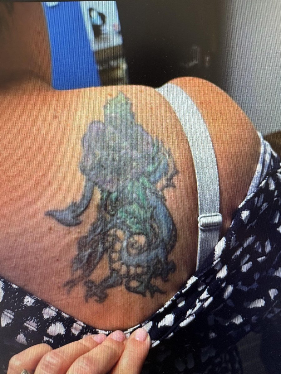 Photo of the tattoo titled Raven Coverup Transforms Old Tattoo