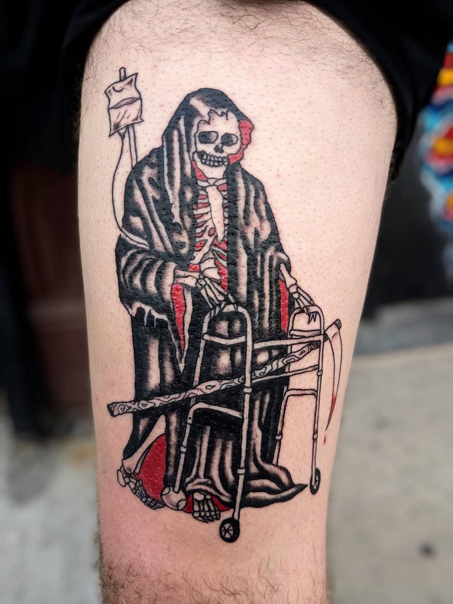 Photo of the tattoo titled Grim Reaper's Embrace