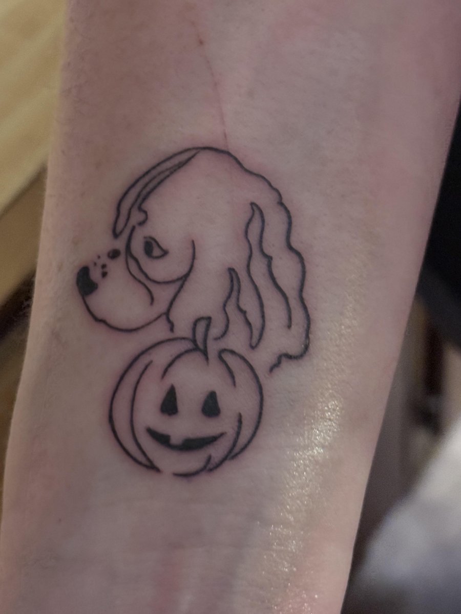 Photo of the tattoo titled Memorial Tattoo for Beloved Pup