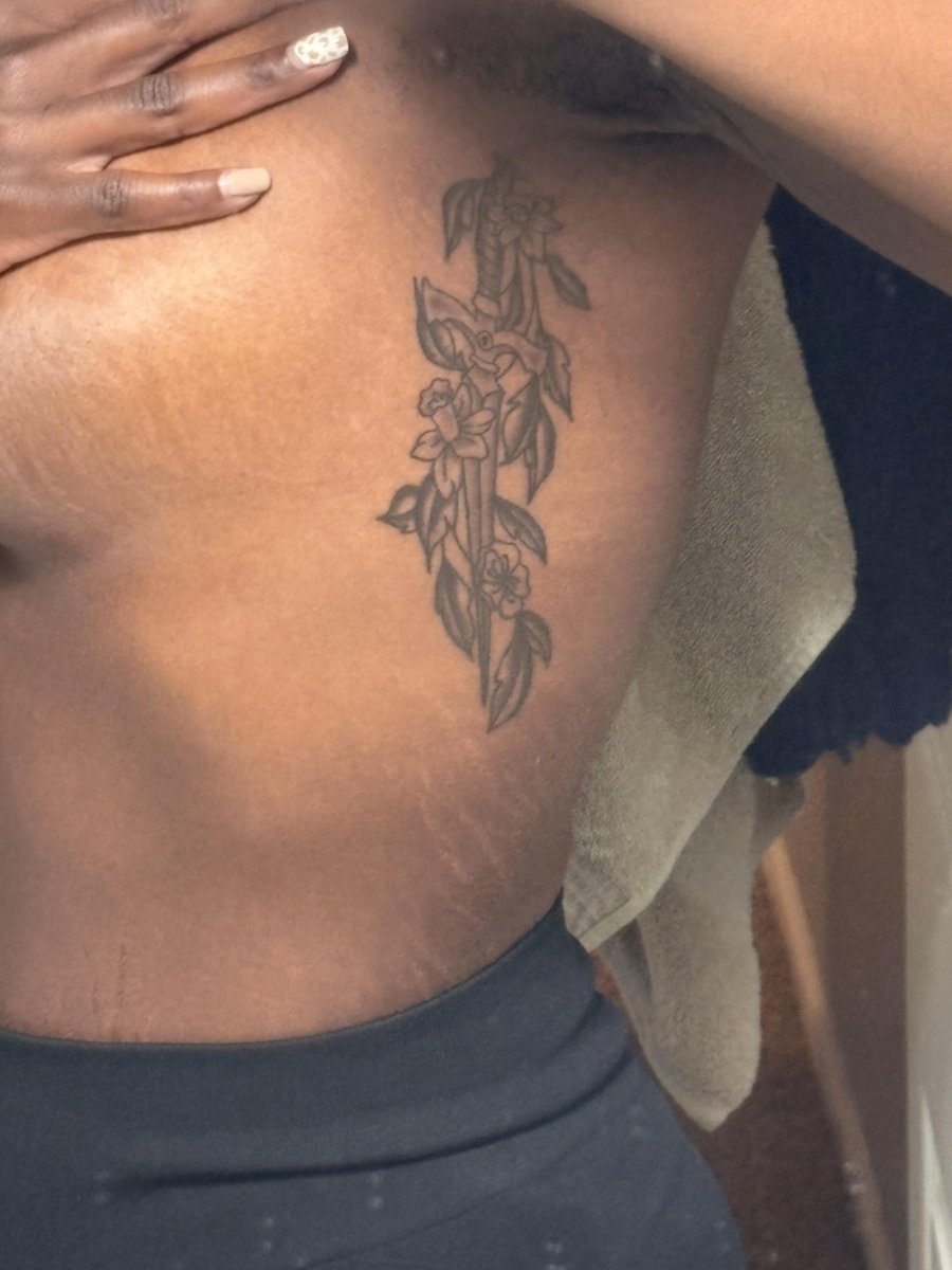 Photo of the tattoo titled Son's Birth Flowers & Dagger
