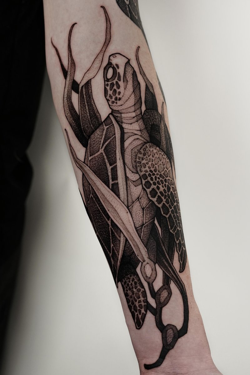 Photo of the tattoo titled Blackwork Sea Turtle Symbolizing Life