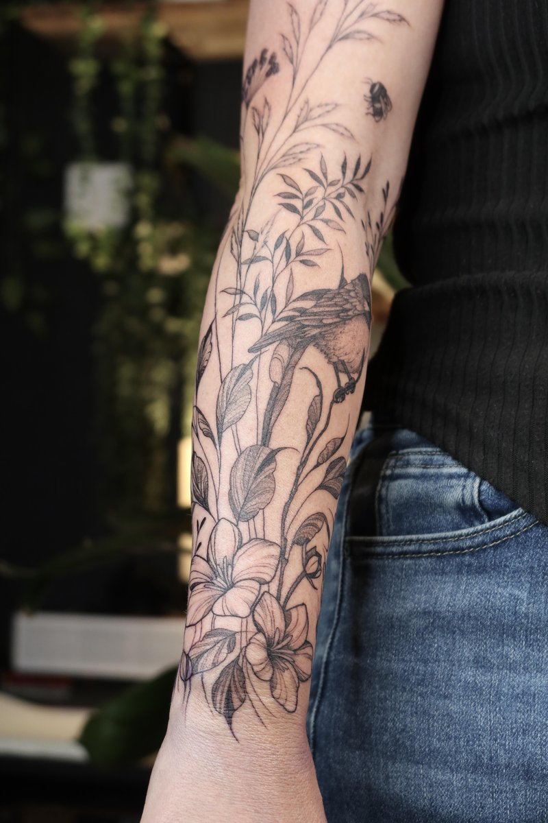 Photo of the tattoo titled Blooming Floral Half Sleeve