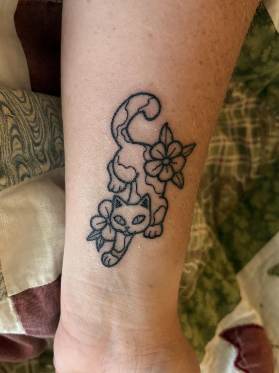 Photo of the tattoo titled Flash Tattoo for Cat Rescue