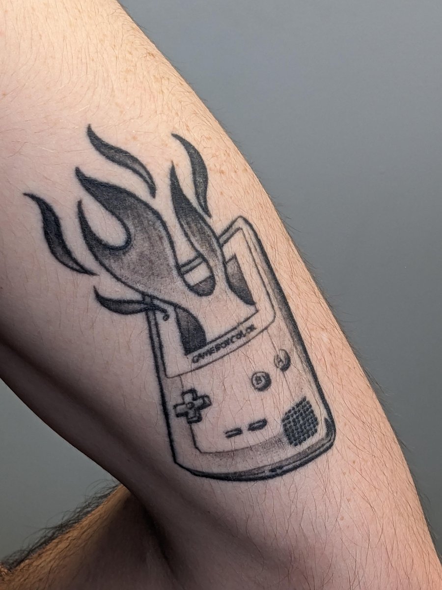 Photo of the tattoo titled Childhood Never Fades
