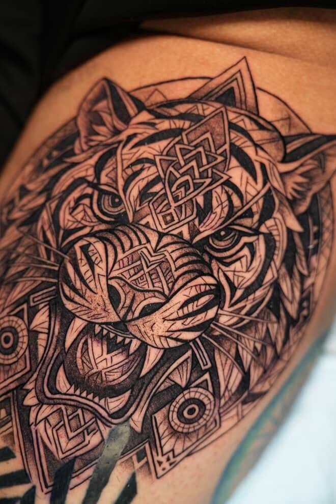 Photo of the tattoo titled Geometric Lion and Tiger Pair