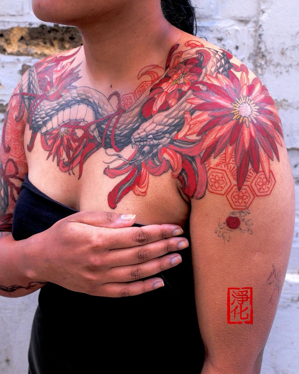 Photo of the tattoo titled 25-Hour Snake and Chrysanthemum Sleeve