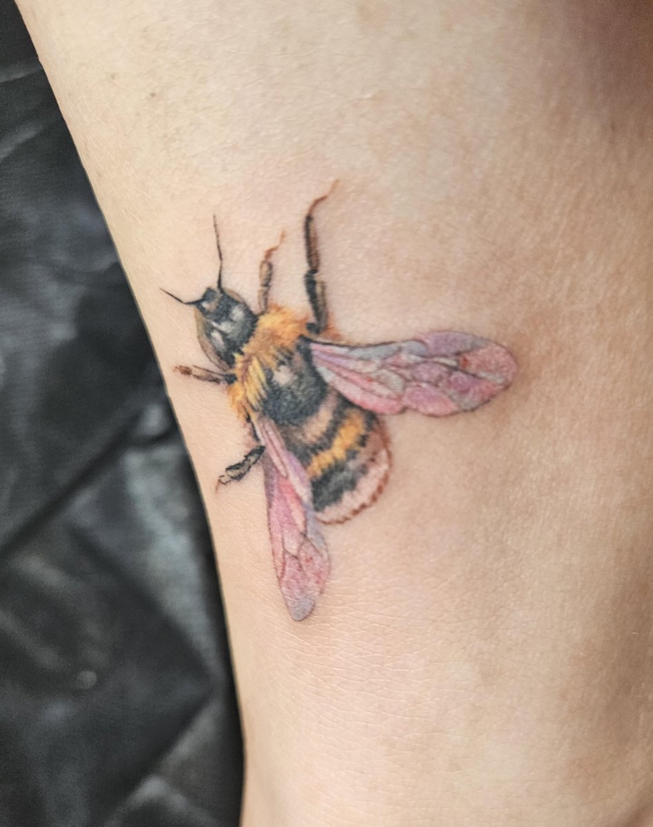 Photo of the tattoo titled My First Tattoo: A Flying Bee