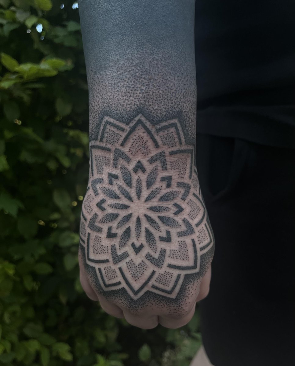 Photo of the tattoo titled Hand Tattoo Completion and Sleeve Progress