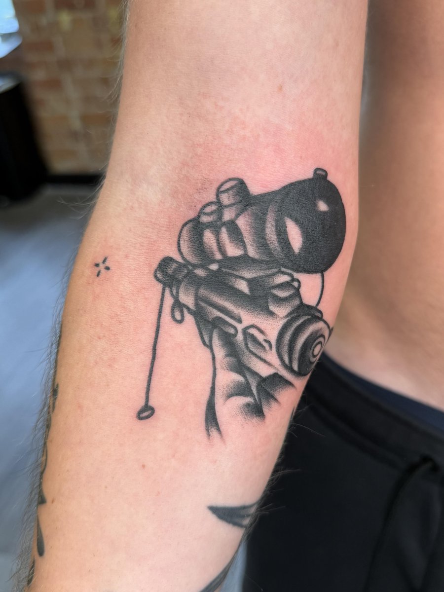 Photo of the tattoo titled Iconic Gaming Gun Tattoo
