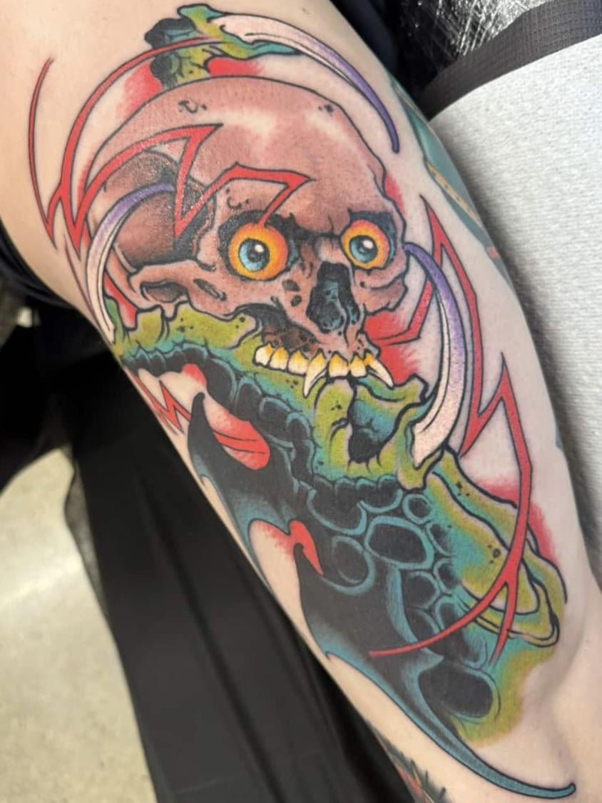 Photo of the tattoo titled Dragon Claw and Skull Power