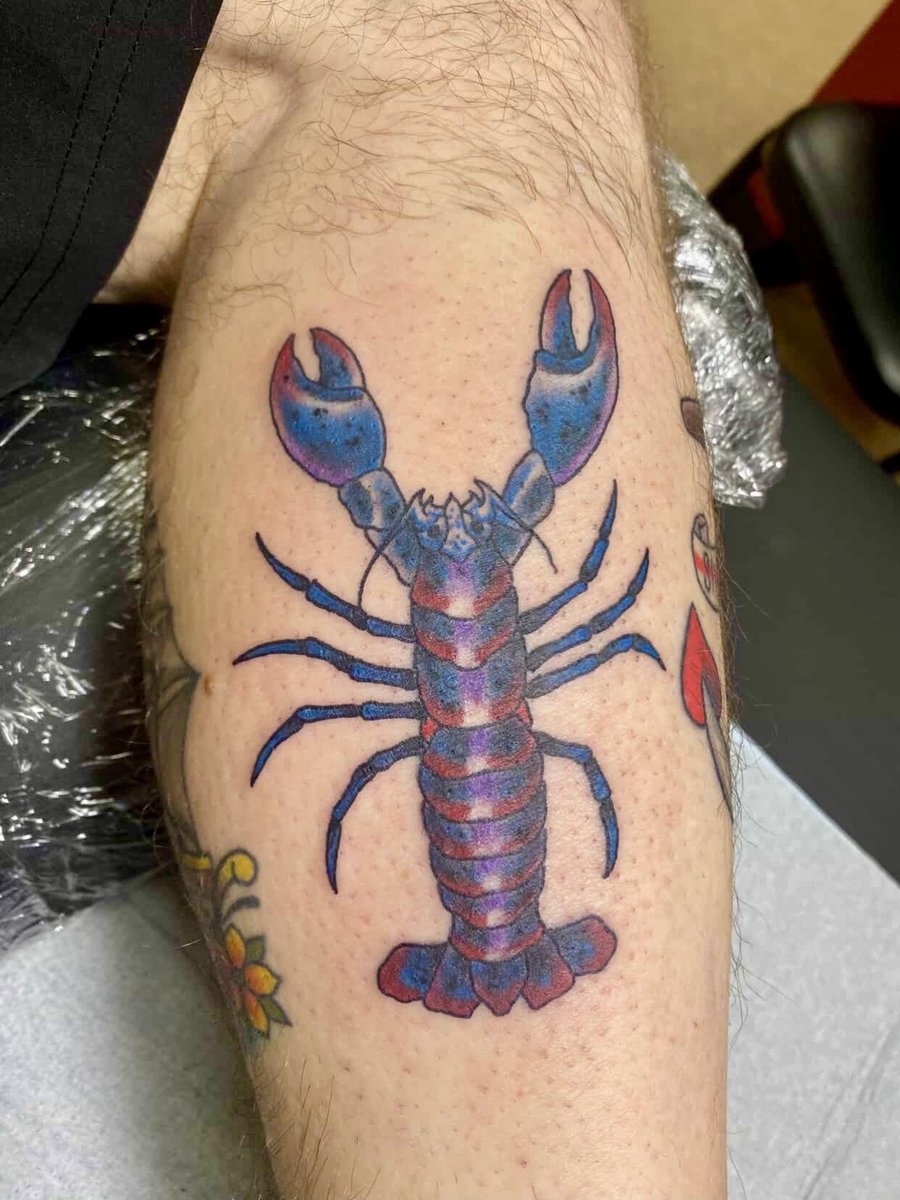 Photo of the tattoo titled My Blue Lobster Companion