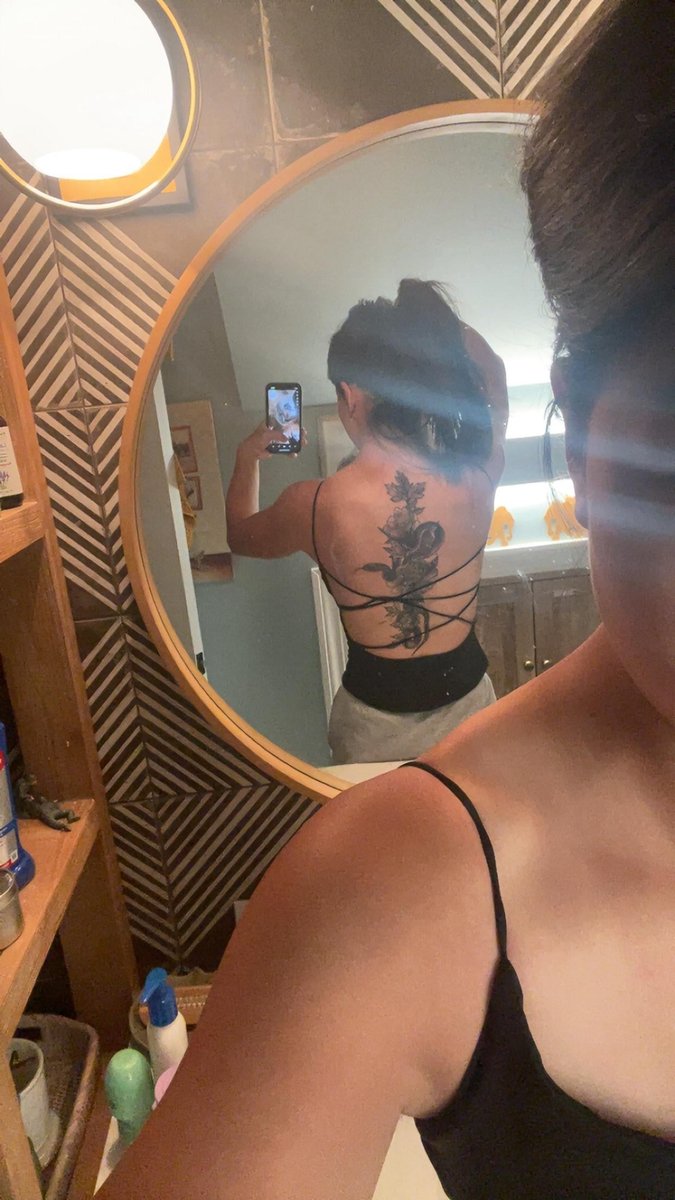 Photo of the tattoo titled Floral Snake Back Piece