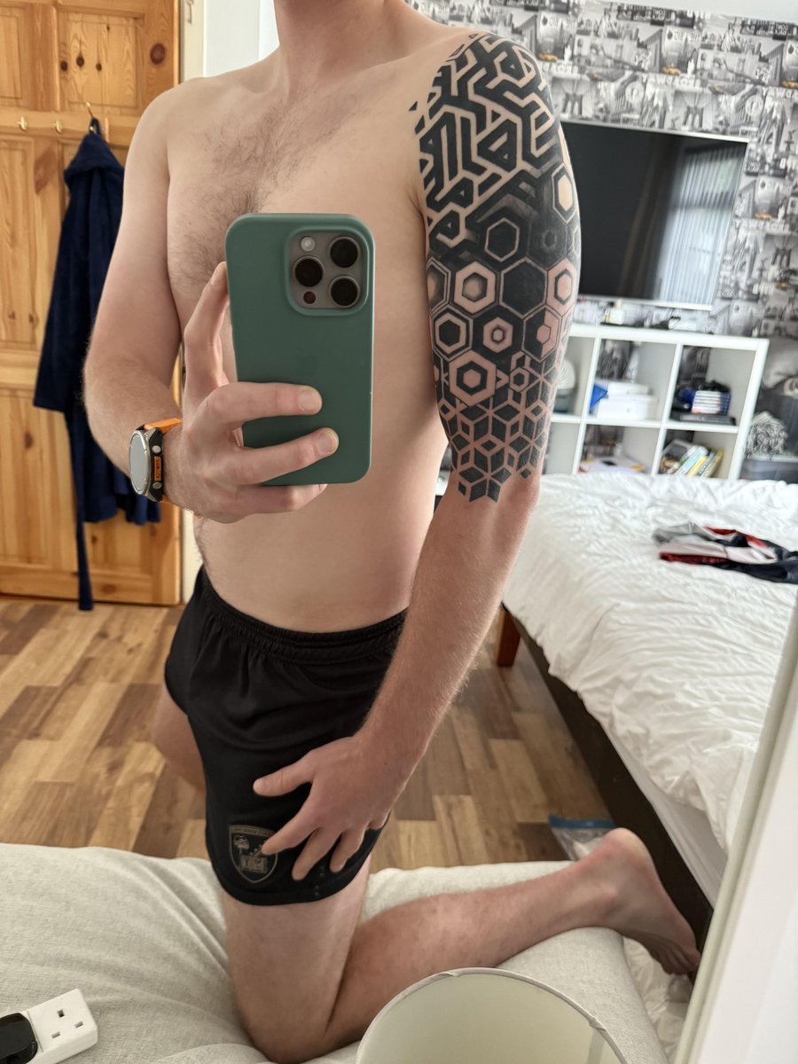 Photo of the tattoo titled Geometric Cover-Up Transformation