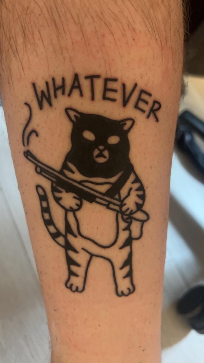 Photo of the tattoo titled My Gangster Cat Companion