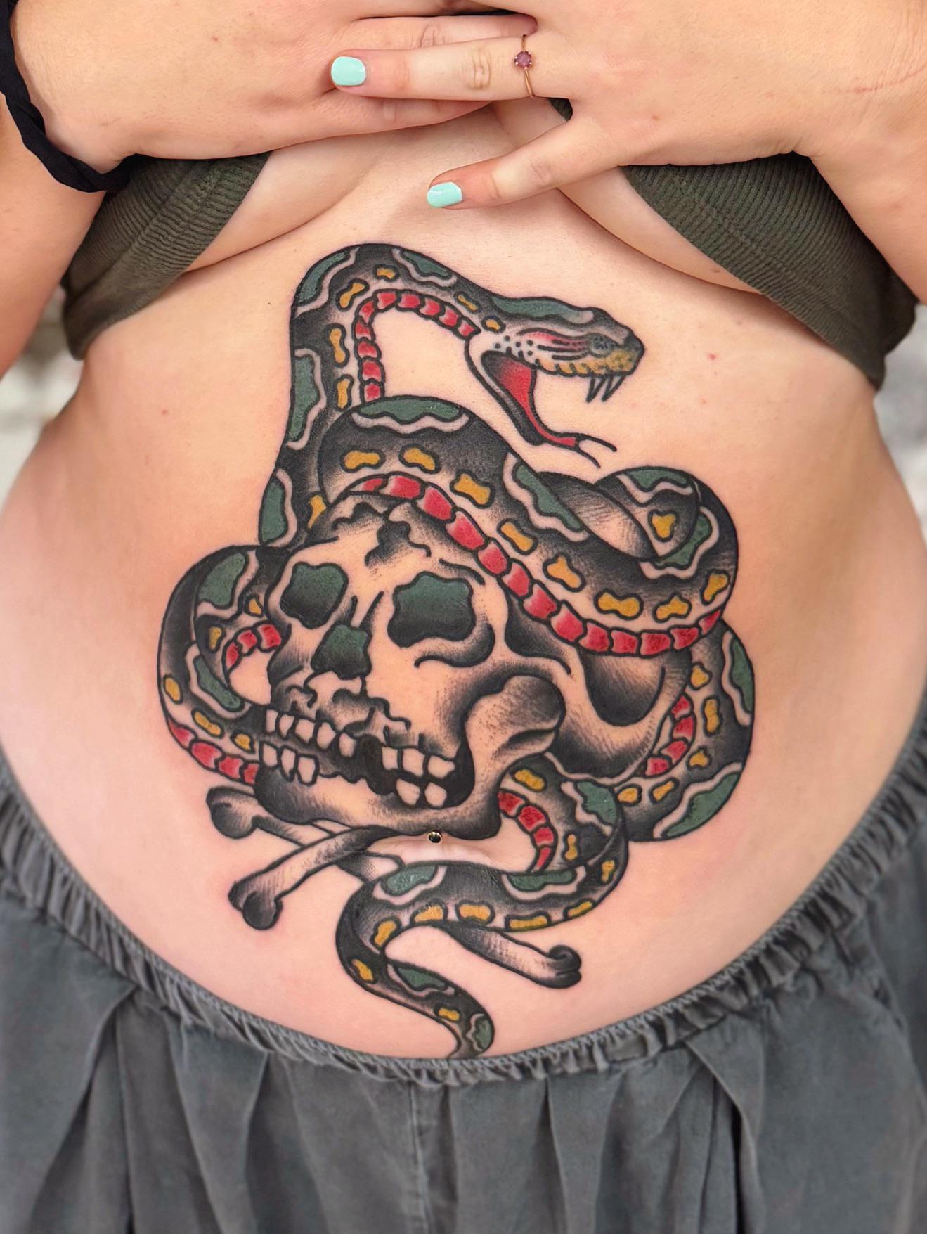 Photo of the tattoo titled Skull and Snake on my tummy : )