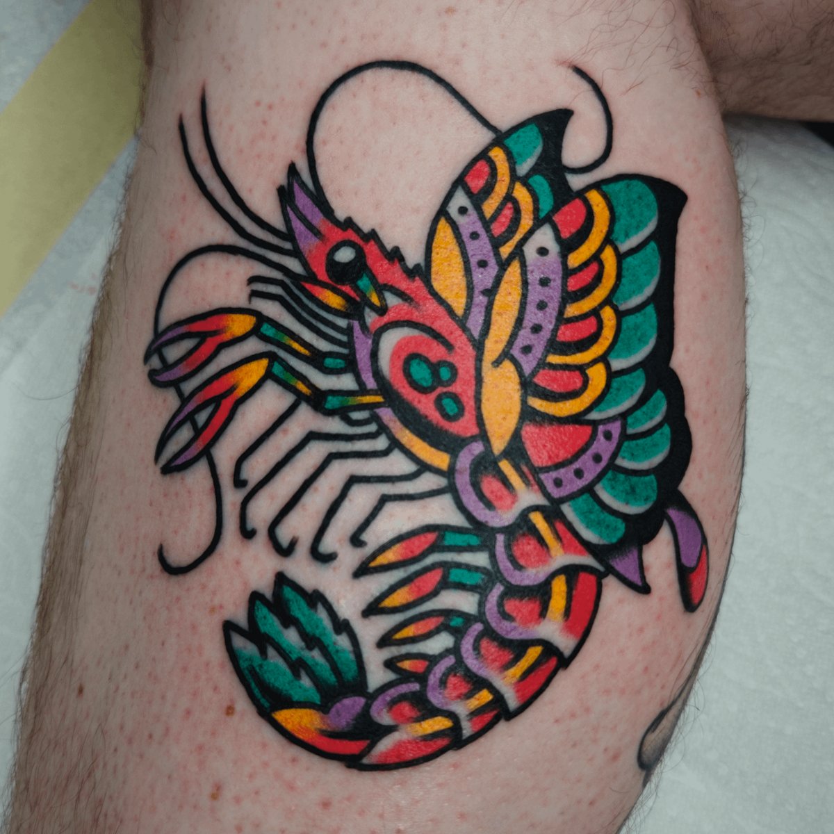 Photo of the tattoo titled Butterfly Shrimp Pun Tattoo