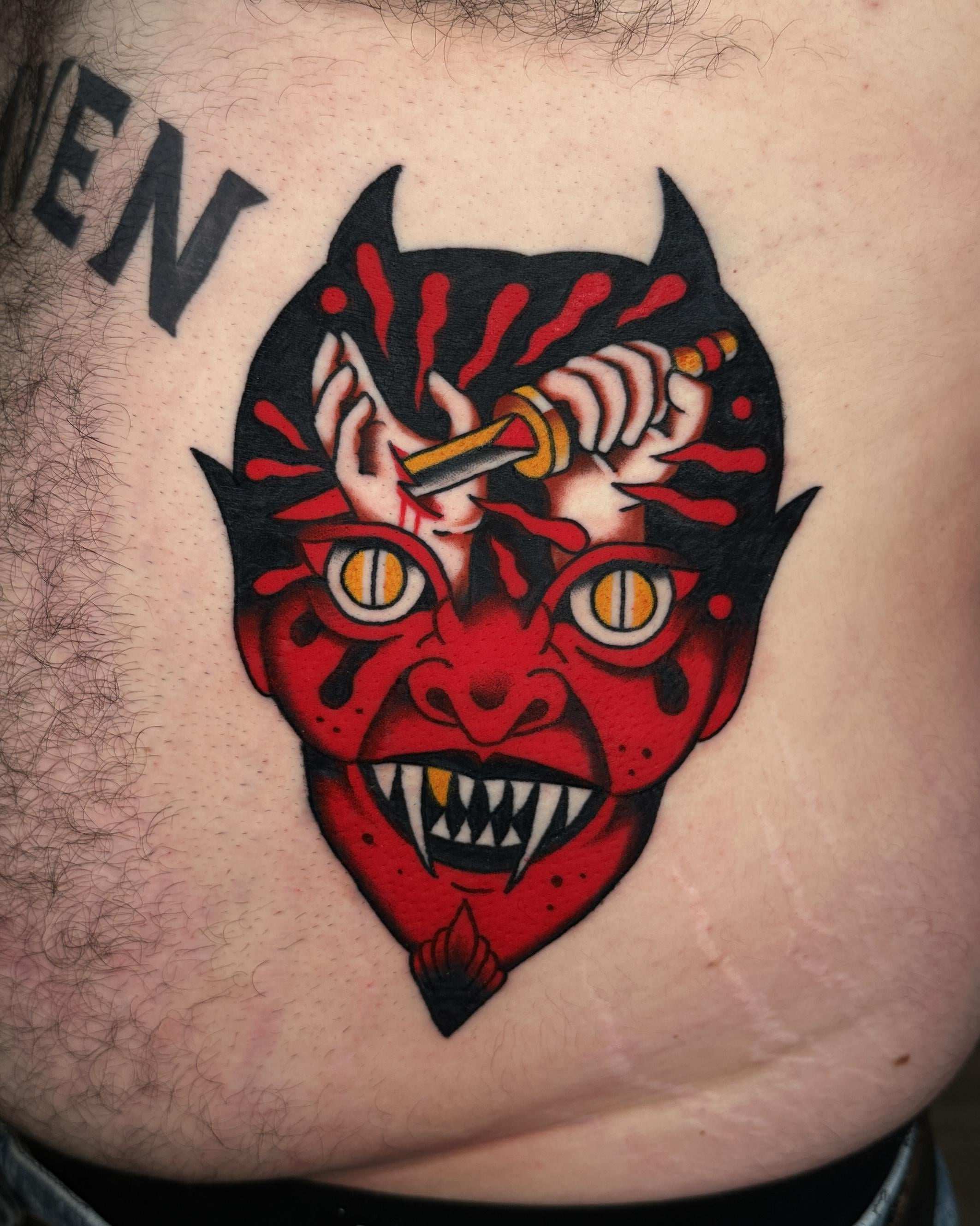 Photo of the tattoo titled Devil Embracing Artistic Rebellion