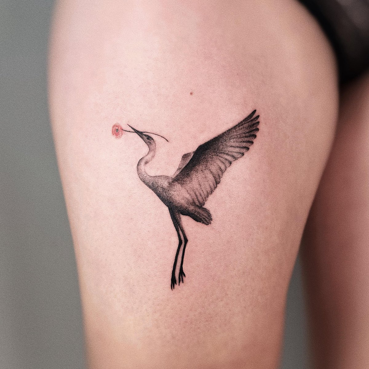 Photo of the tattoo titled Crane and Poppy - NYC Bloom