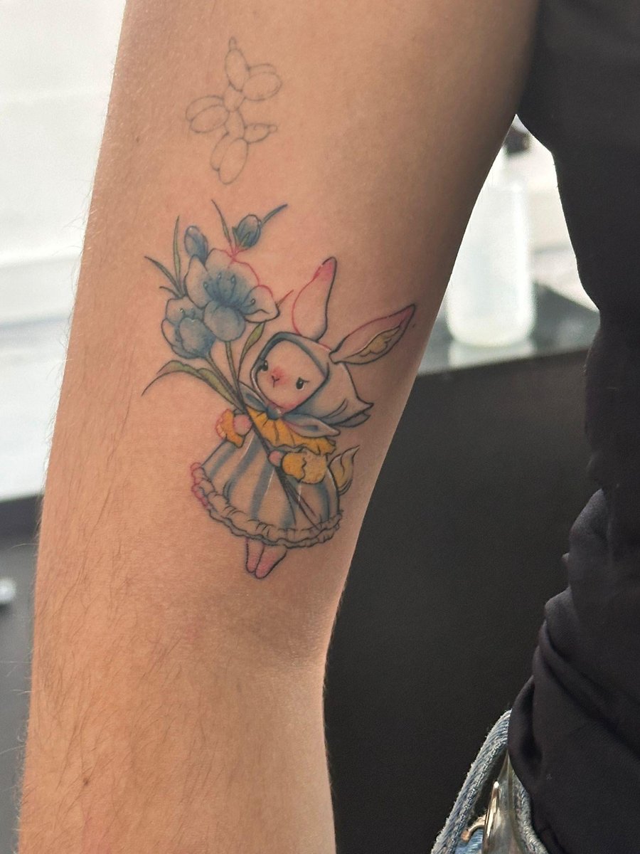 Photo of the tattoo titled Bunny in a Striped Dress