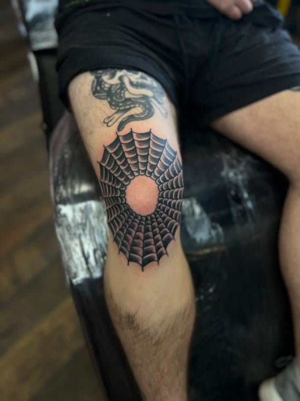 Photo of the tattoo titled My Painful Knee Tattoo Experience