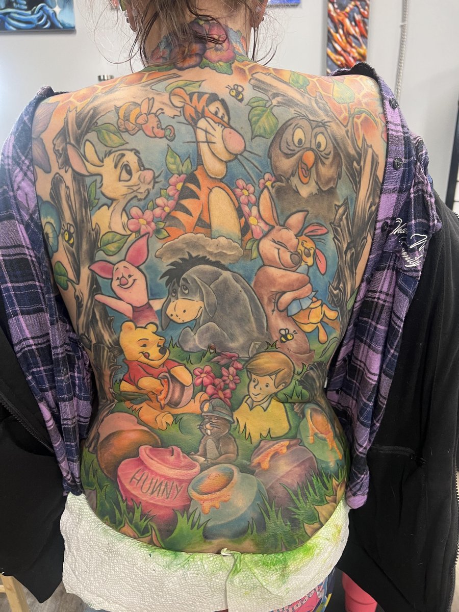 Photo of the tattoo titled Wife's Enchanting 100 Acre Wood Back Piece