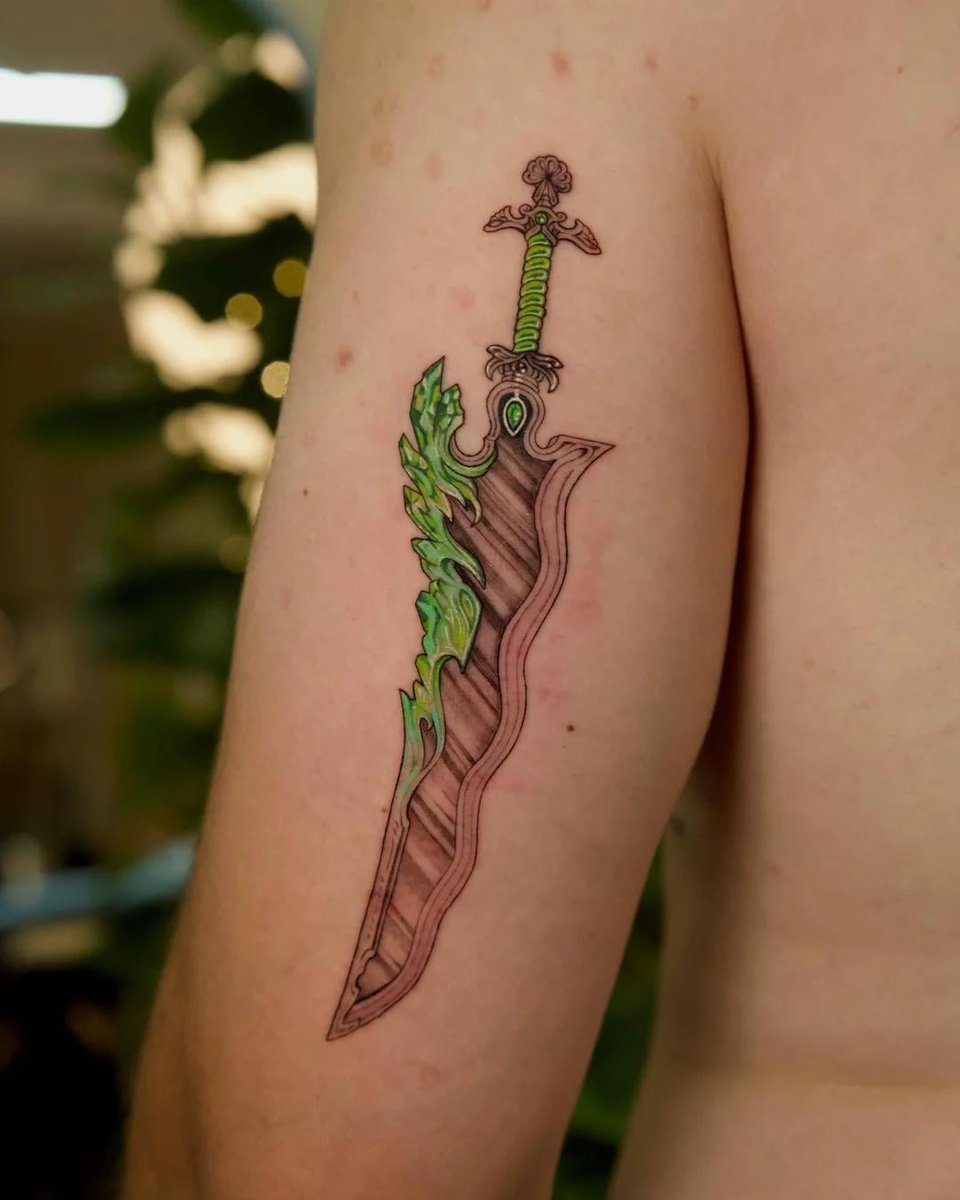Photo of the tattoo titled Stormlight Archive Shardblades