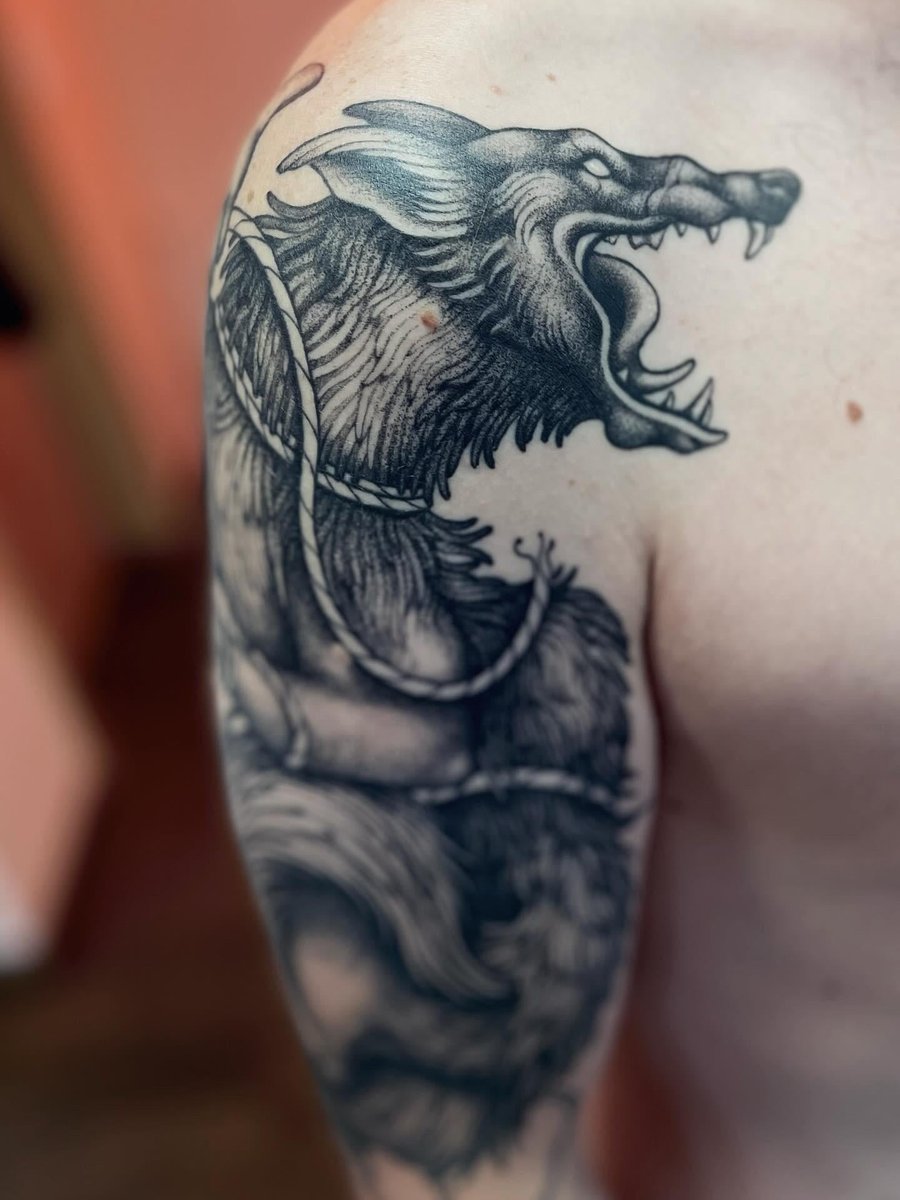 Photo of the tattoo titled Fenrir Wolf's Fierce Arrival