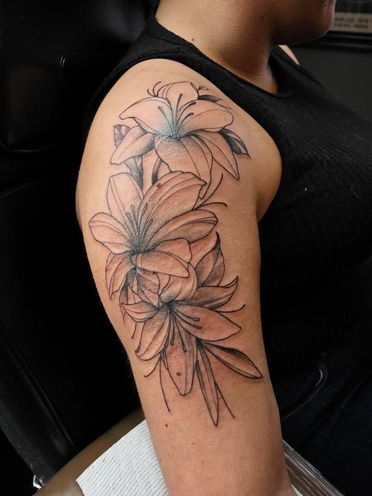 Photo of the tattoo titled Adding to my Lily Tattoo