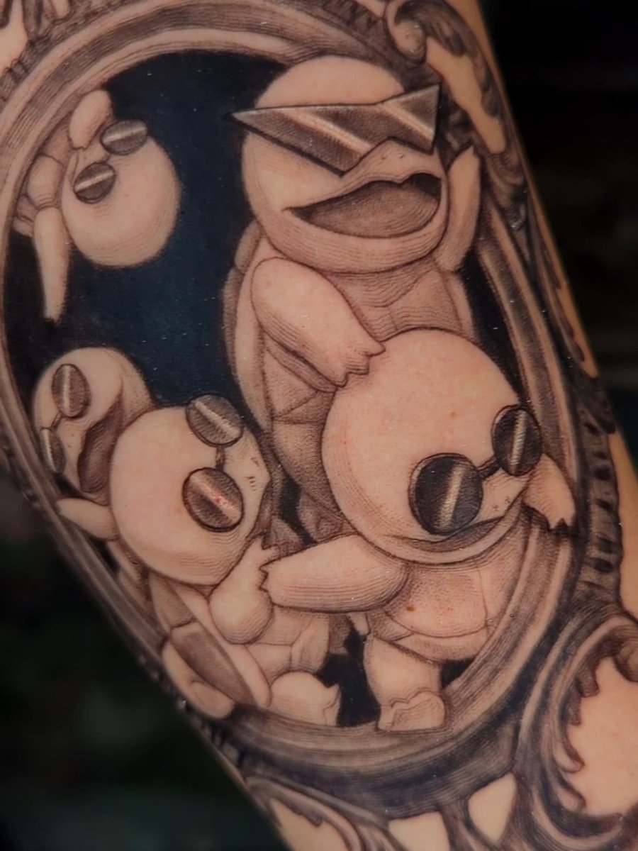 Photo of the tattoo titled Squirtle Squad Tattoo Tribute